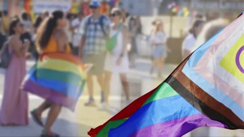 Progress pride flag waving during an lgbtqia parade celebration 库存影片 347362858