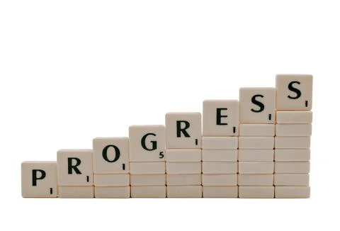 Progress - from scrabble letters on stairs from another blocks Stock Photos