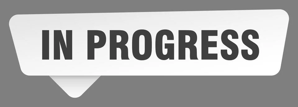 In progress sign. in progress white sticker isolated on gray background Illustrazione stock
