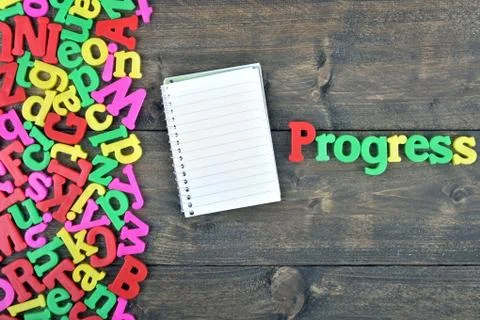 Progress on wooden table Stock Photos