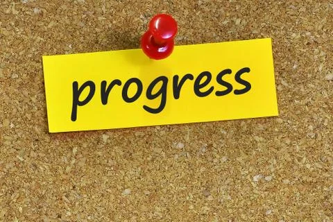 Progress word on notes paper with cork background Stock Photos