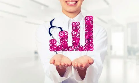 Progressing graph presented in female palms as symbol of success Stock Photos