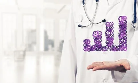 Progressing graph presented in female palms as symbol of success Stock Photos