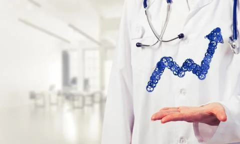 Progressing graph presented in female palms as symbol of success Stock Photos