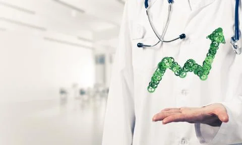 Progressing graph presented in female palms as symbol of success Stock Photos