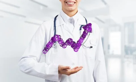 Progressing graph presented in female palms as symbol of success and improvement Stock Photos