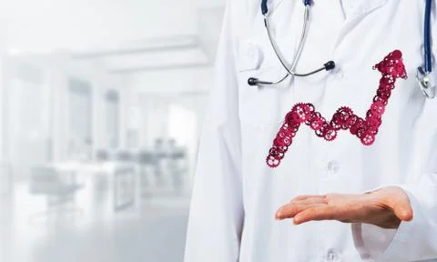 Progressing graph presented in female palms as symbol of success and improvement Stock Photos