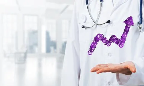 Progressing graph presented in female palms as symbol of success and improvement Stock Photos