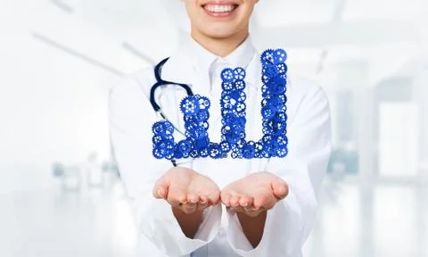 Progressing graph presented in female palms as symbol of success and improvement Stock Photos
