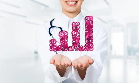 Progressing graph presented in female palms as symbol of success and improvement Stock Photos