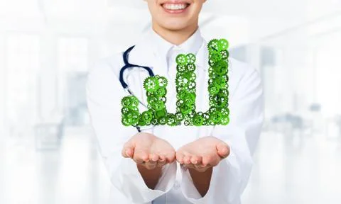Progressing graph presented in female palms as symbol of success and improvement Stock Photos