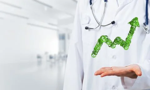 Progressing graph presented in female palms as symbol of success and improvement Stock Photos