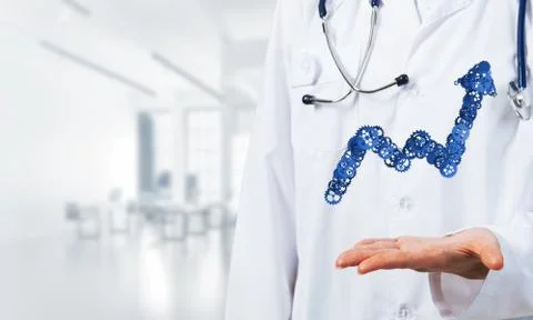 Progressing graph presented in female palms as symbol of success and improvement Stock Photos