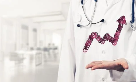 Progressing graph presented in female palms as symbol of success Stock Photos