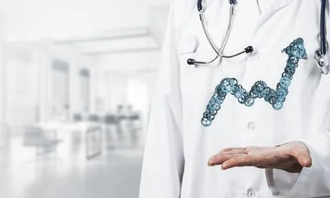 Progressing graph presented in female palms as symbol of success Stock Photos