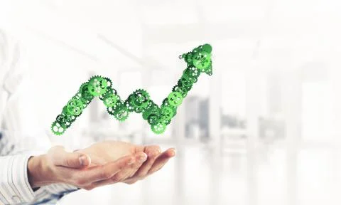 Progressing graph presented in male palms as symbol of success a Stock Photos