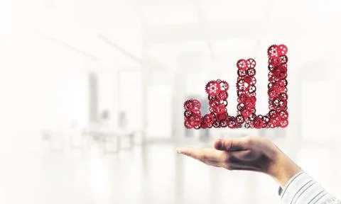 Progressing graph presented in male palms as symbol of success a Stock Photos