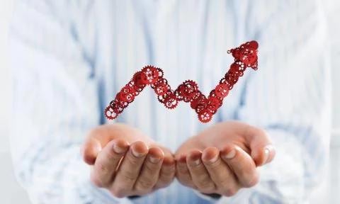 Progressing graph presented in male palms as symbol of success and improvement Stock Photos