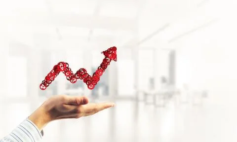 Progressing graph presented in male palms as symbol of success a Stock Photos