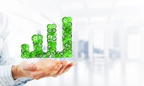 Progressing graph presented in male palms as symbol of success and improvement Stock Photos