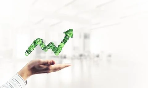 Progressing graph presented in male palms as symbol of success a Stock Photos