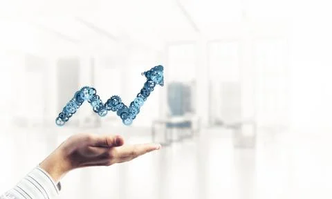 Progressing graph presented in male palms as symbol of success a Stock Photos