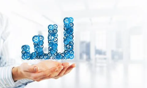 Progressing graph presented in male palms as symbol of success and improvement Stock Photos