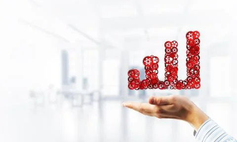 Progressing graph presented in male palms as symbol of success and improvement Stock Photos