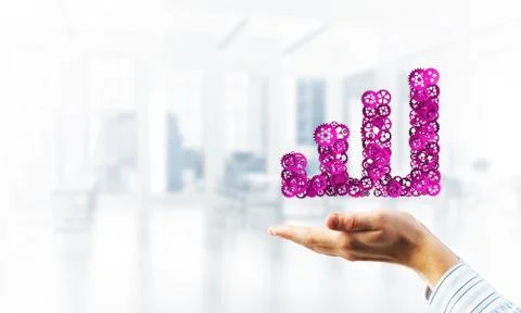 Progressing graph presented in male palms as symbol of success and improvement Stock Photos