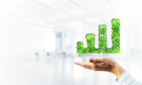 Progressing graph presented in male palms as symbol of success and improvement Stock Photos