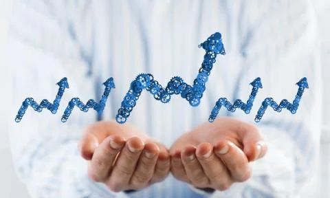 Progressing graph presented in male palms as symbol of success and improvement Stock Photos