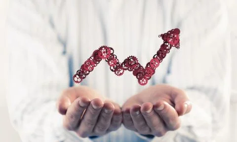 Progressing graph presented in male palms as symbol of success a Stock Photos