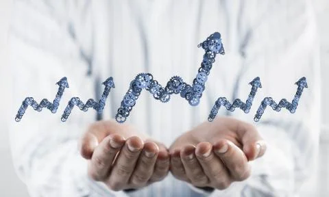 Progressing graph presented in male palms as symbol of success a Stock Photos