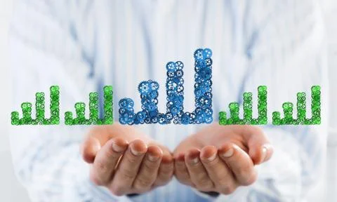 Progressing graph presented in male palms as symbol of success and improvement Stock Photos