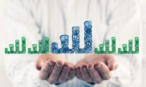 Progressing graph presented in male palms as symbol of success a Stock Photos