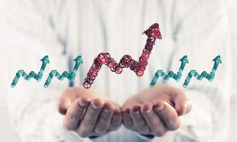 Progressing graph presented in male palms as symbol of success a Stock Photos