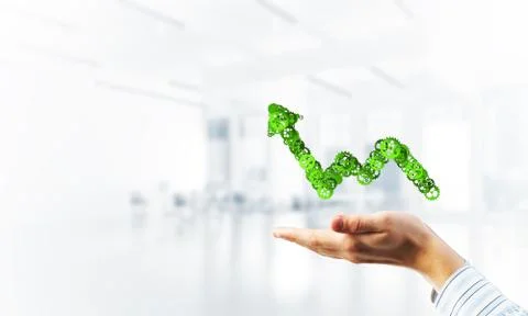 Progressing graph presented in male palms as symbol of success and improvement Stock Photos