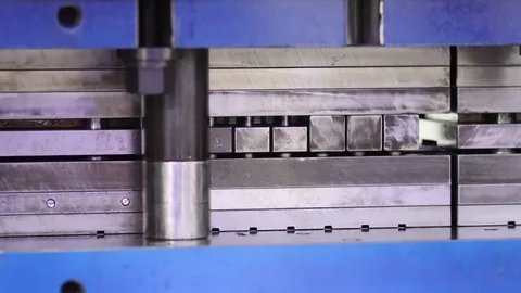 Progressive die stamping process for high productivity i Stock Footage 129936569