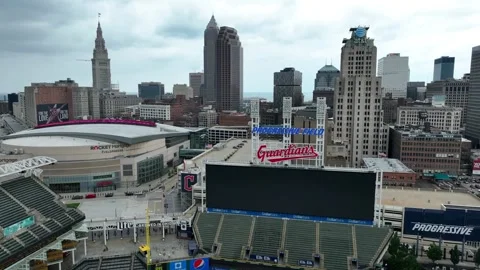 Progressive Field and Rocket Mortgage Fieldhouse with downtown Cleveland Stock Footage 246901967