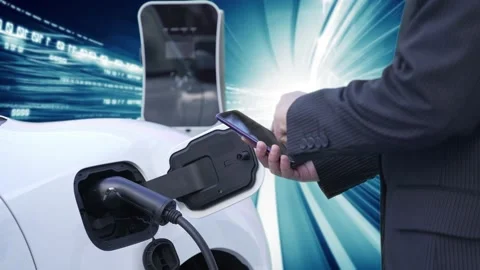 Progressive man check EV car status on smartphone, background of binary code. Stock Footage 237267310