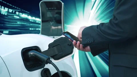 Progressive man check EV car status on smartphone, background of binary code. Stock Footage 248231717