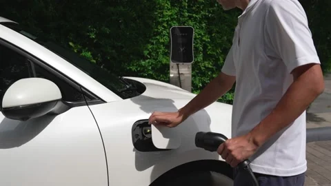Progressive man install cable plug to hi... | Stock Video | Pond5