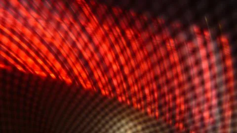 Progressive rhythmic red shaded light layers seen through a net fence pattern Stock Photos