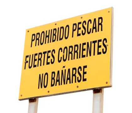 Prohibido pescar, fuertes corrientes, no baarse yellow sign. No fishing, stro Stock Photos