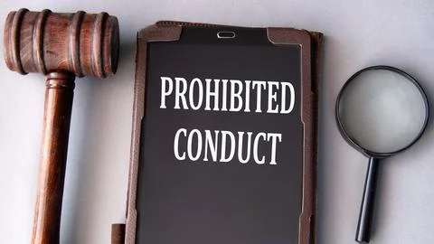 PROHIBITED CONDUCT - words on an electronic notepad with a judge's gavel in.. Stock Photos