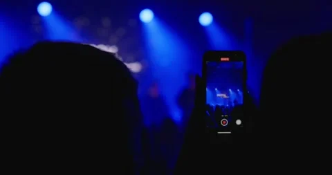 Prohibited filming during the performance of a famous artist. Stock Footage 270716695