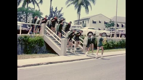 Project Apollo astronauts walking with breathing apparatus Stock Footage 263453109