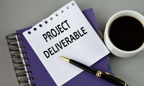 PROJECT DELIVERABLE - words on a white sheet with a cup of coffee Stock Photos