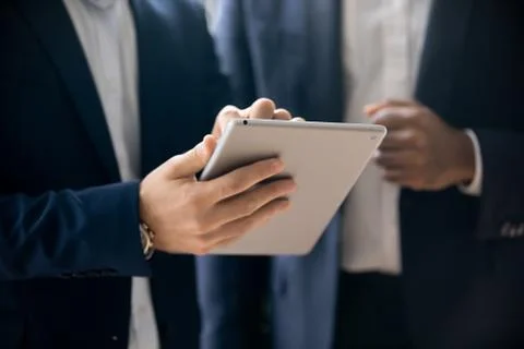 Project developer holding tablet make proposal to customer closeup image Stock Photos