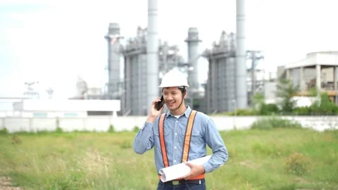 Project engineering talking telephone and holding drawing plan and check Constru 動画素材 279505227